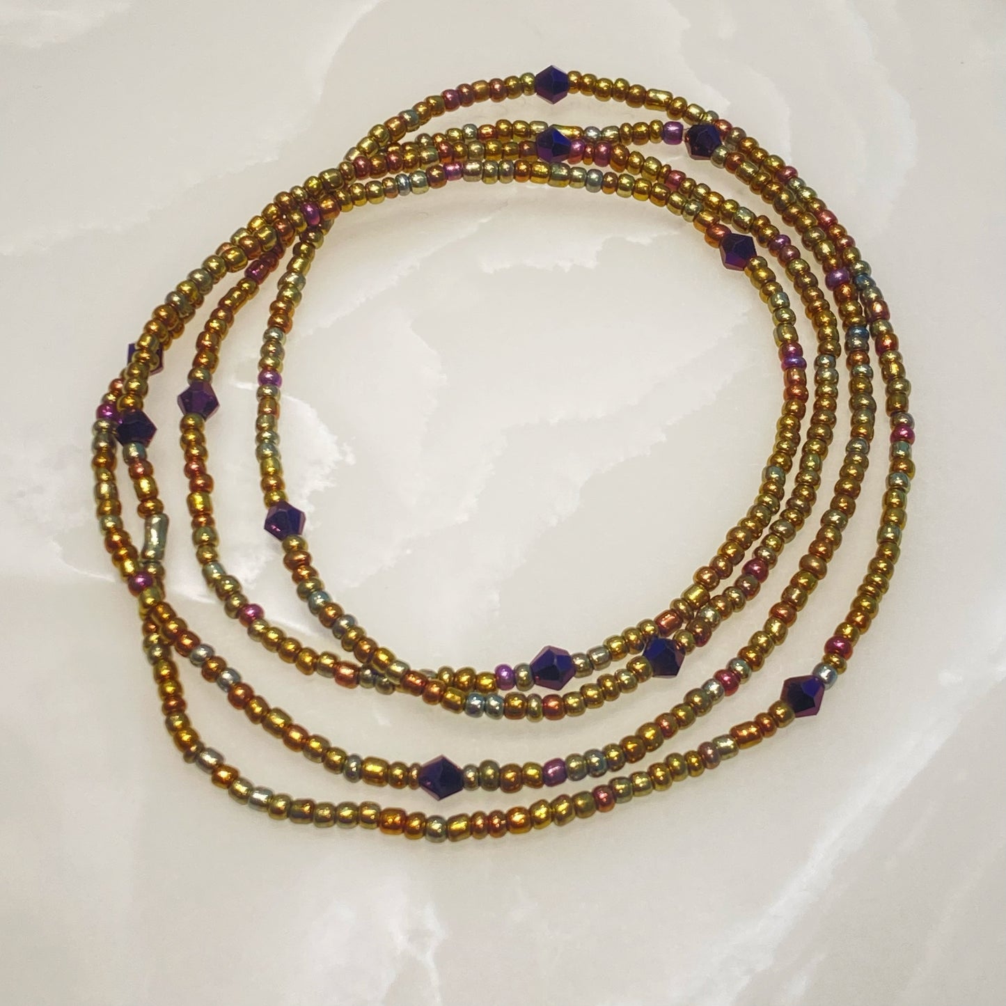 Perles de taille couleur dorée et violet